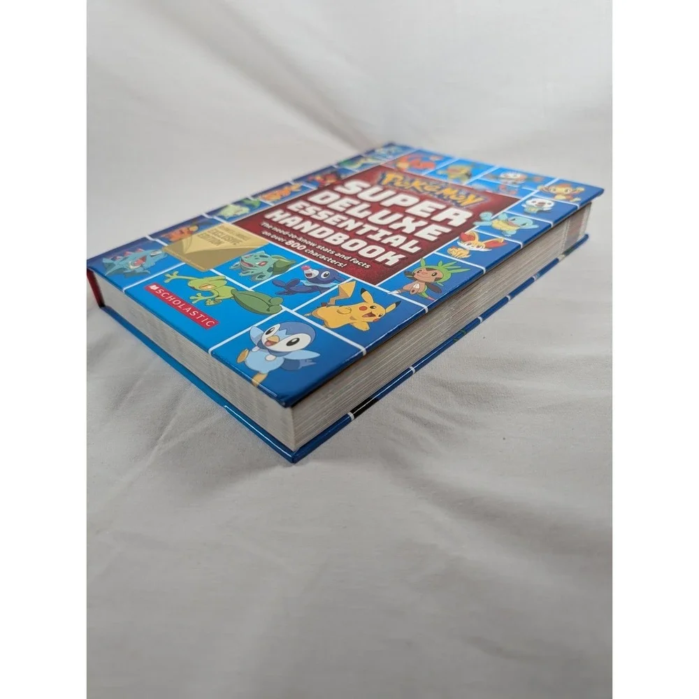 Pokemon Super Deluxe Essential Handbook Scholastic Exclusive HC (Hardcover)